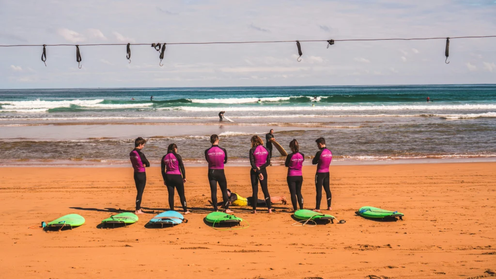 Corporate team building surf lesson on the Atlantic coast - incentive travel activity in northern Spain